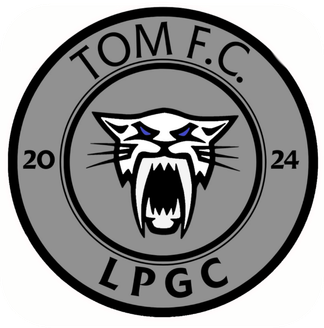 Escudo de TOM FC